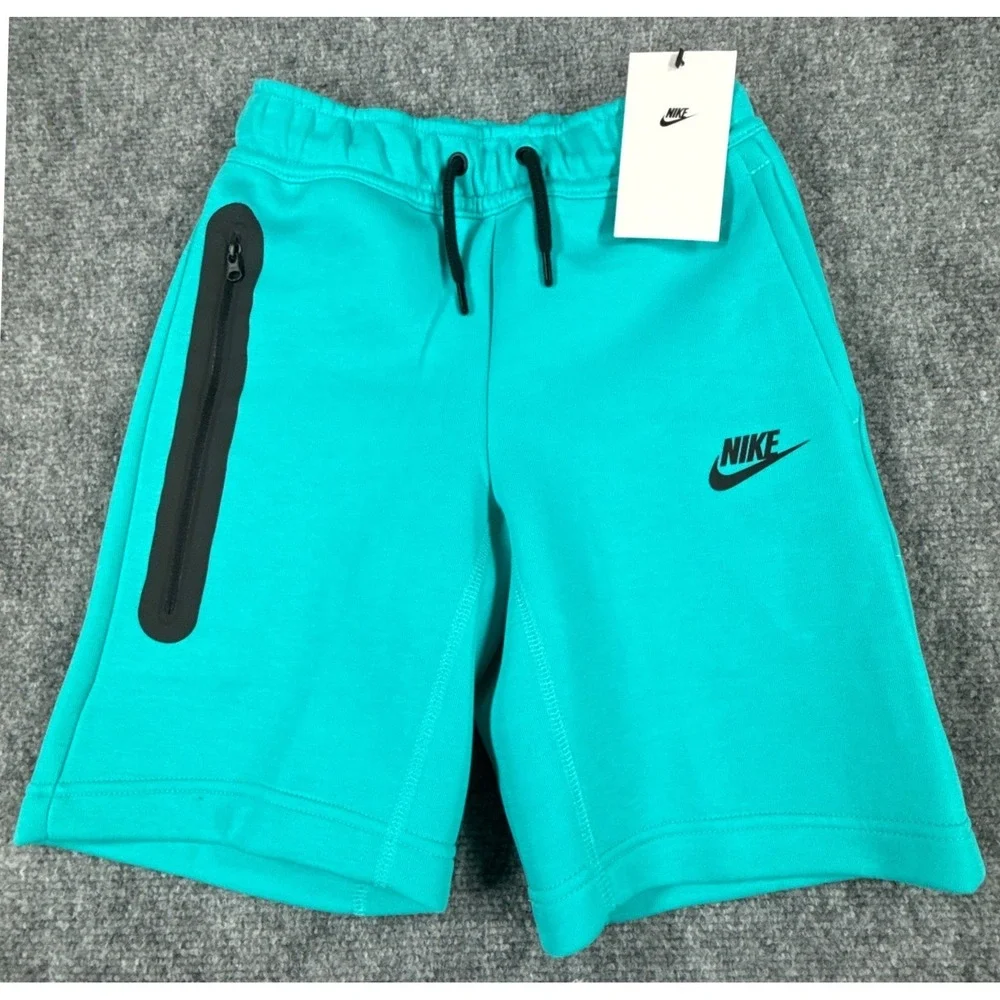 Nike Tech Kids Small Teal Green Fleece Drawstring Shorts Zip Pocket NWT